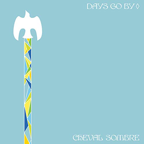 Album cover: blue background with white bird and colorful geometric design.