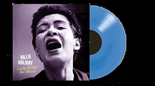 Billie Holiday album cover and a bright blue vinyl record shown.