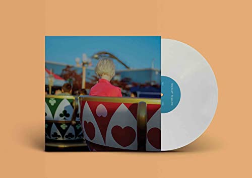Vinyl record with cover art depicting a person on a carousel.
