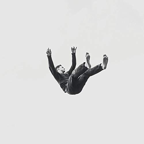 Black and white album cover depicting a man appearing to fall.