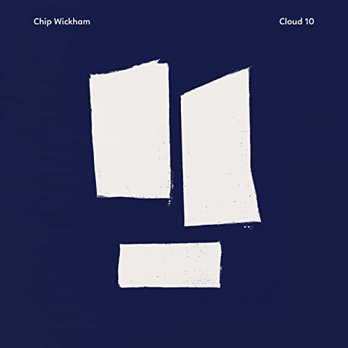 Dark blue CD cover with abstract white shapes resembling the number 11.