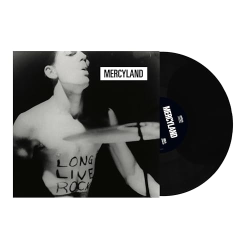 Black vinyl record with album cover featuring a shirtless man and text.