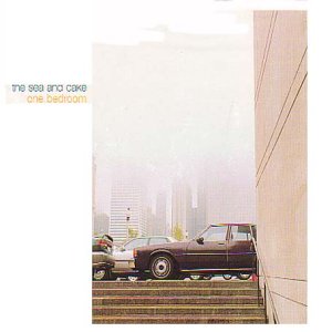 Album cover for The Sea and Cake’s “One Bedroom” featuring cars and stairs.