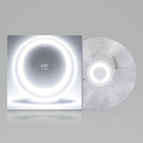 Vinyl record with a circular, glowing design on the album cover.