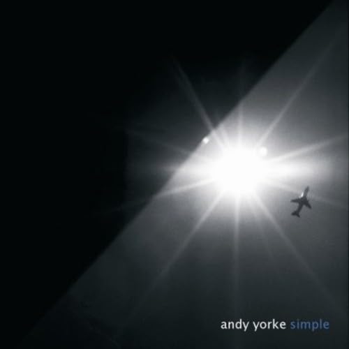 CD cover: airplane silhouetted against a bright, sunlit sky.
