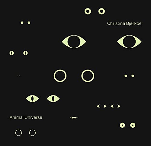 CD cover: black background with stylized glowing eyes and circles.