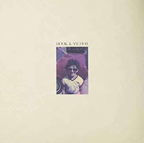Vinyl record cover featuring a young person with sunglasses.