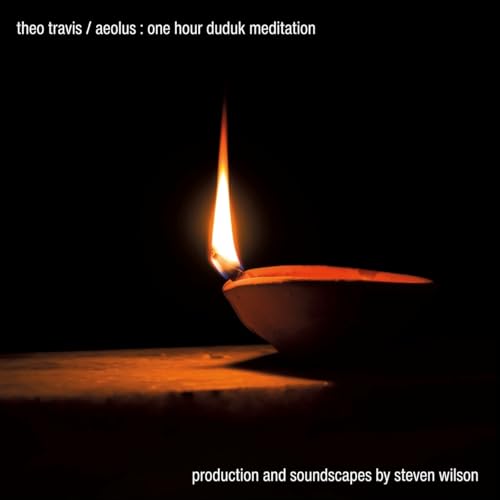 CD cover with a dark background and a single lit candle flame.