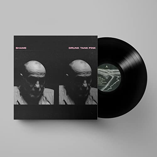 Shame’s “Drunk Tank Pink” vinyl record and album cover with two portraits.