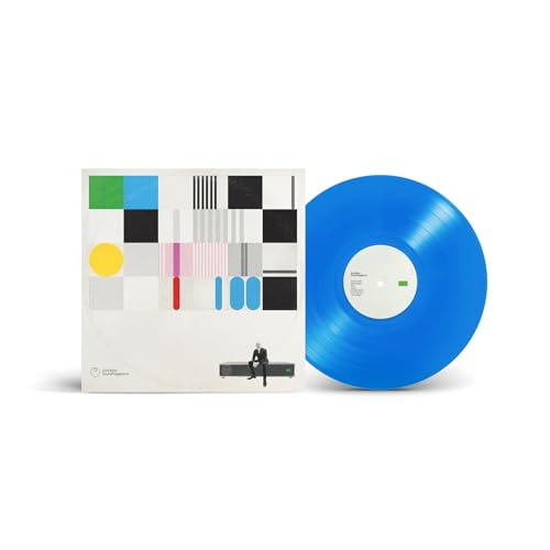 Vinyl record and album cover with abstract geometric design.