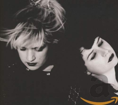 Black and white CD cover featuring two people with dark makeup.