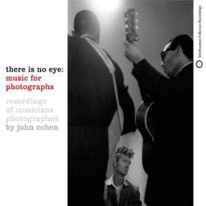 CD cover: black and white photo of musicians playing instruments.