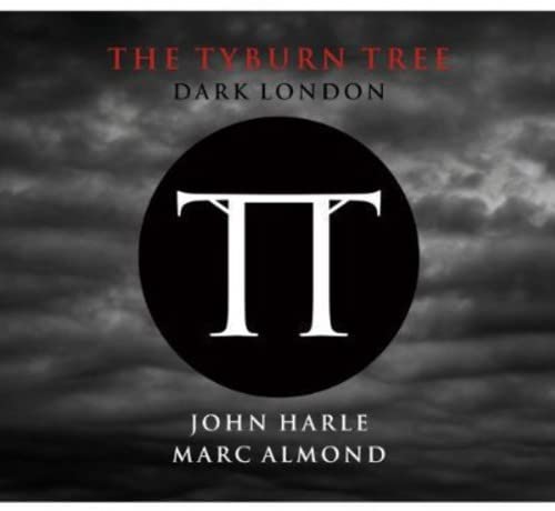 CD cover with dark, cloudy background and central black circle with white “TT”.