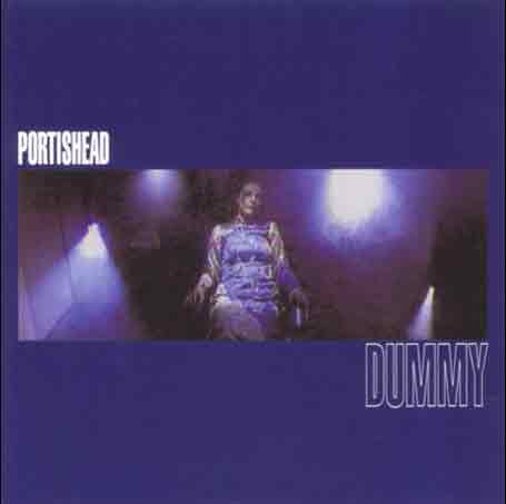 Portishead’s “Dummy” album cover: a woman seated in a blue-toned corridor.