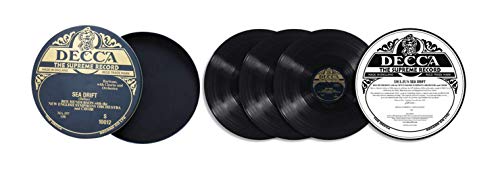 Four black vinyl records with Decca labels, arranged on a white background.