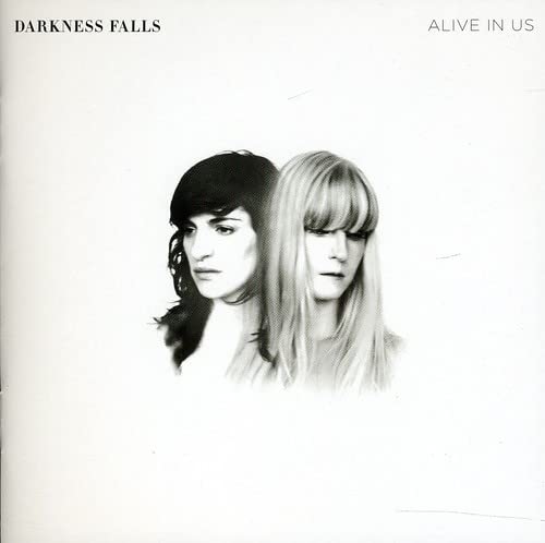 CD cover: two pale figures with contrasting hair, black and blonde.