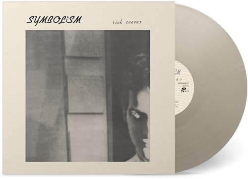 Rick Cuevas Symbolism album cover with a metallic silver vinyl record beside it.