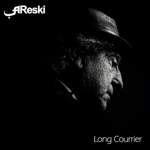 Black and white portrait of a man in a hat, album cover.