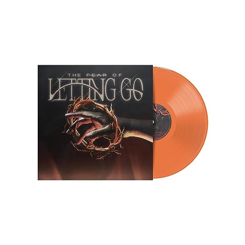 Orange vinyl record with album cover depicting hands and thorns.