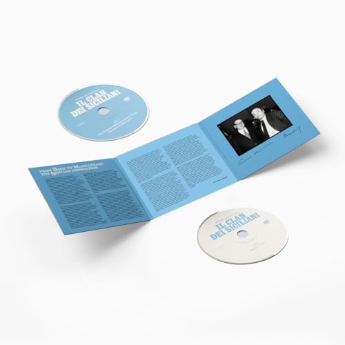 Open CD case with silver disc and black and white photo inside.