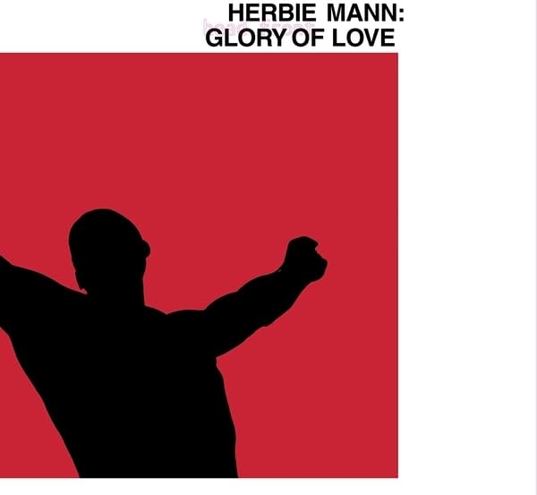Red album cover with a silhouette of a man raising his fist.