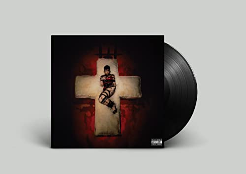 Demi Lovato album cover “HOLY FVCK” with vinyl record beside it.