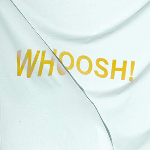 Close-up of vinyl record sleeve with yellow “WHOOSH!” text.