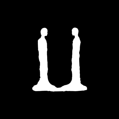 White album cover for G-dragon’s “Ubermensch” featuring two silhouetted figures.