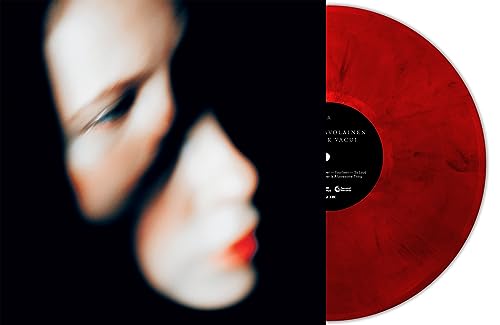 Record sleeve with a woman’s face and a red marbled vinyl record.