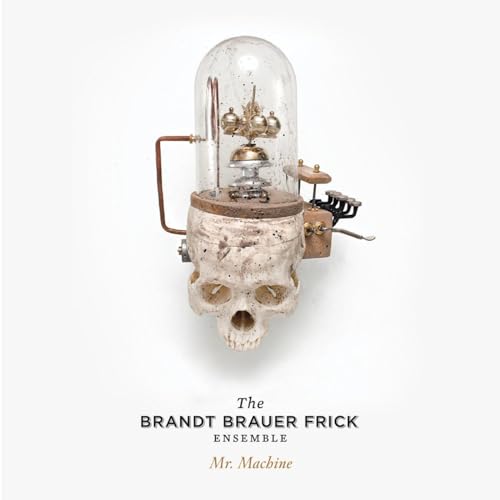 Skull-shaped machine with glass dome, album cover for Brandt Brauer Frick.