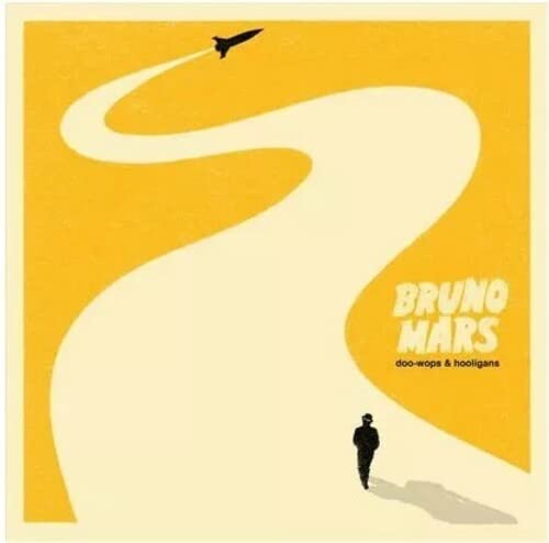 Bruno Mars "Doo-Wops & Hooligans" vinyl album cover, yellow and white design.