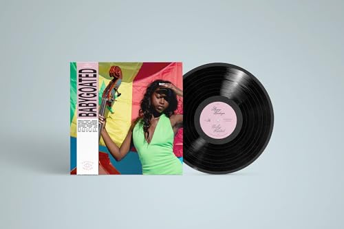 Vinyl record and album cover featuring a woman with a cello.
