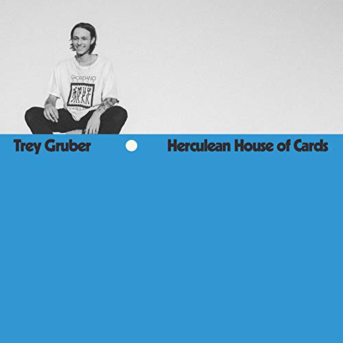 Black and white portrait of Trey Gruber over a blue background.