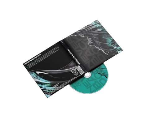 CD case open, showing a teal disc and black and white cover art.