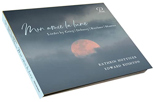 CD case with a moonlit sky and white script title, "Mon amie la lune".