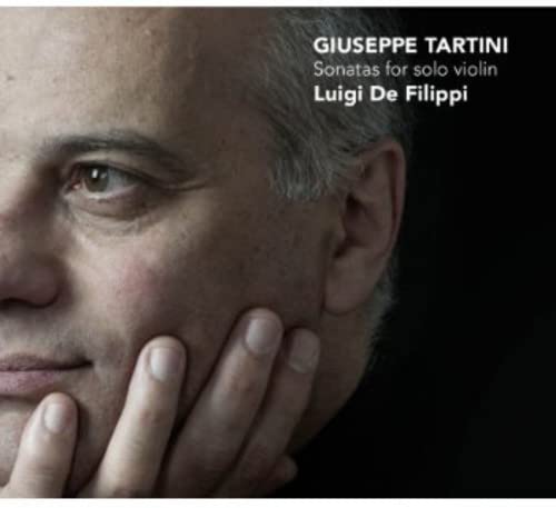 CD cover featuring a close-up portrait of a man with gray hair.