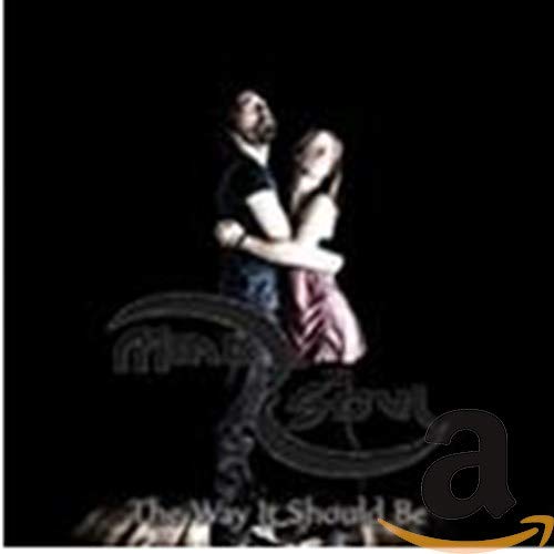 CD cover: Couple embracing against a dark background with script text.