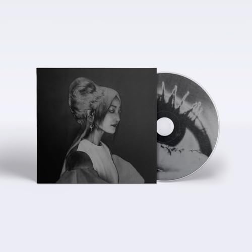 CD case and disc featuring a woman with ornate hairstyle in grayscale.