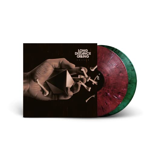 Vinyl record with red and green swirl, and album cover showing a hand.