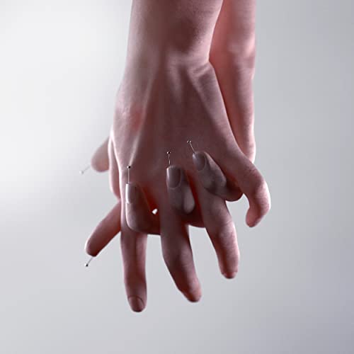 Close-up of hands with small pins inserted into fingertips, gray background.