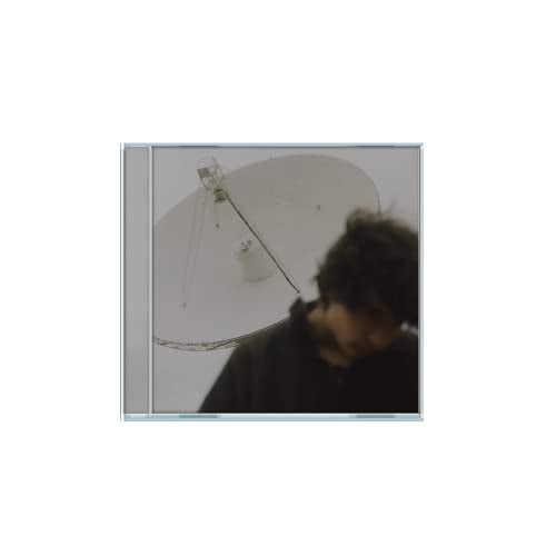 CD case with a person looking up at a satellite dish.