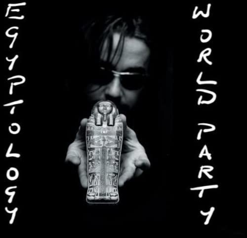 Album cover for World Party’s “Egyptology” featuring a man and a pharaoh mask.