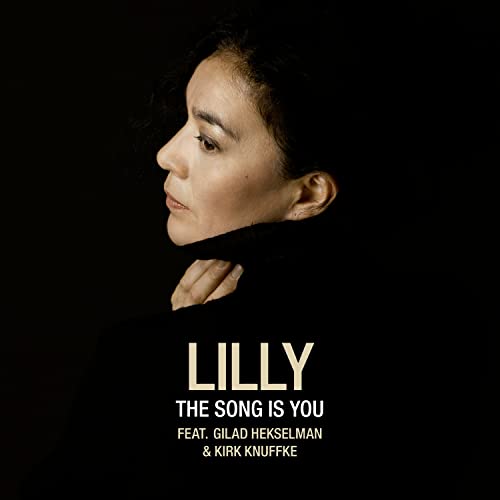 CD cover featuring a portrait of singer Lilly, with album title text.