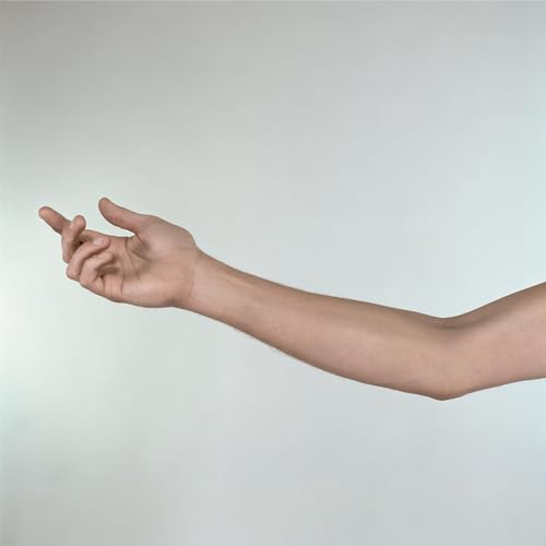 CD case with a hand reaching out, pale background.