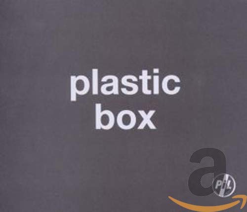 Dark grey square cover with the white text plastic box centered.
