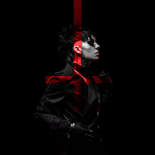 Dark portrait of a person with striking makeup and a red cross.