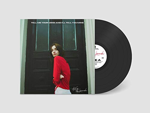 Vinyl record of King Hannah's "Tell Me Your Mind," featuring a woman in red.