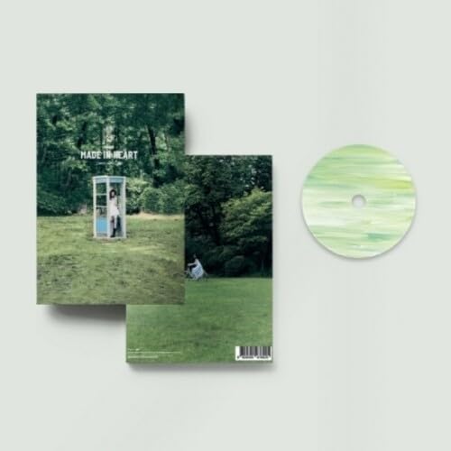 CD case and disc with a person in a phone booth in a field.