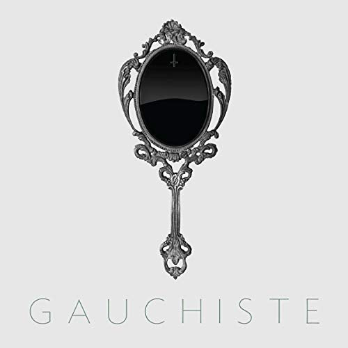 Ornate, dark-colored hand mirror against a light gray background with text below.