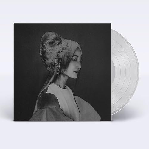 Vinyl record with grayscale portrait of a woman with updo hairstyle.